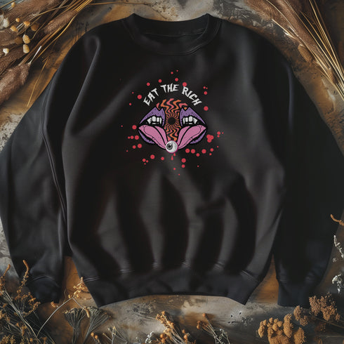 a black sweatshirt featuring a psychedelic "Eat the Rich" design with an eyeball and vampire teeth,